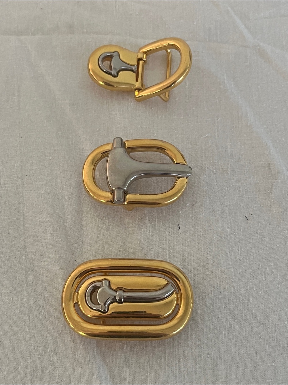 Faux ‘Gucci’ Gold-Tone Oval Belt Buckles. Lot of Three